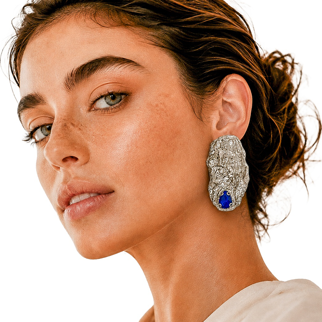 Folded Resistance — Handmade Sculptural Paper Earrings — studio view
