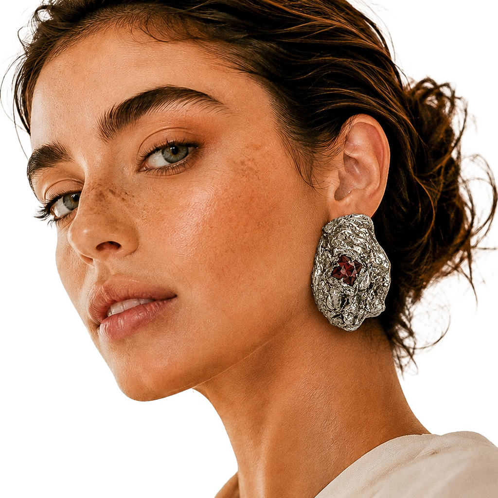 Eroded Light — Handmade Sculptural Paper Earrings — studio view