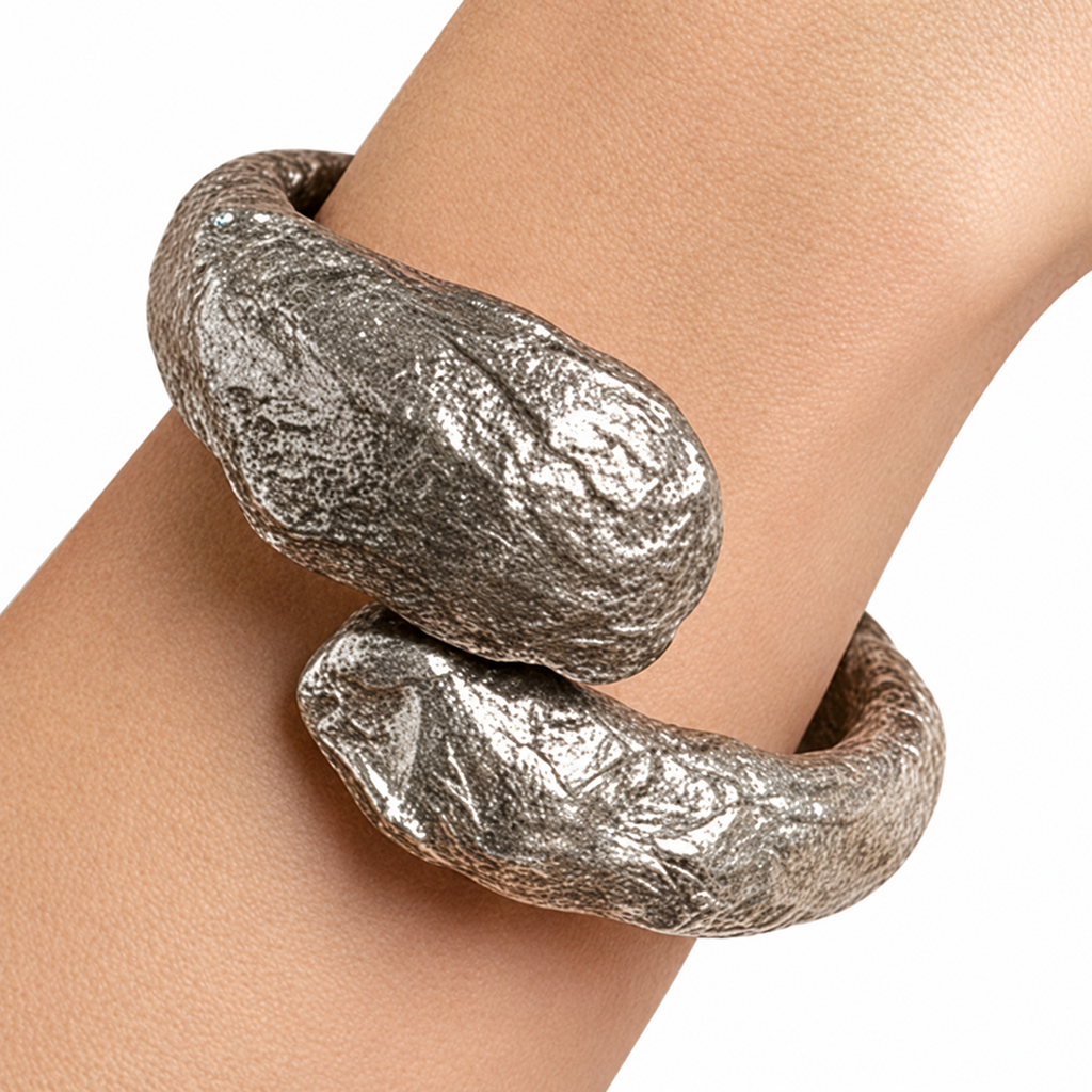 Held Orbit — Sculptural Paper Cuff Bracelet — studio view