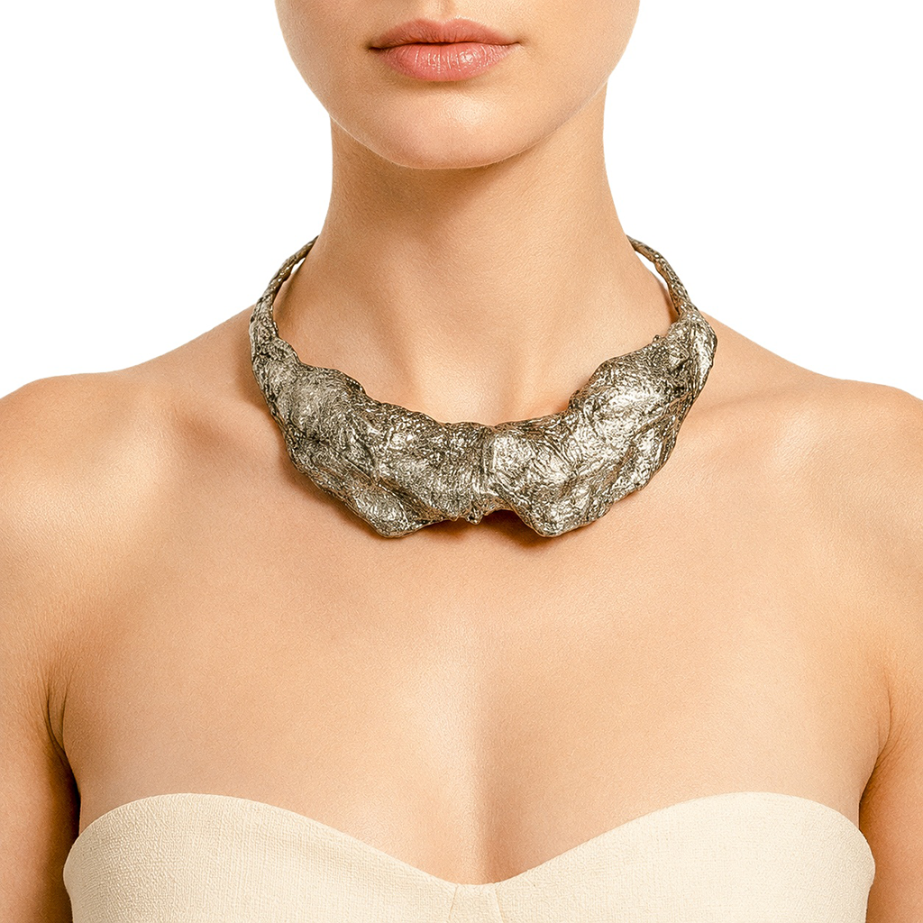 Silver Compression — Sculptural Paper Collar Necklace — studio view