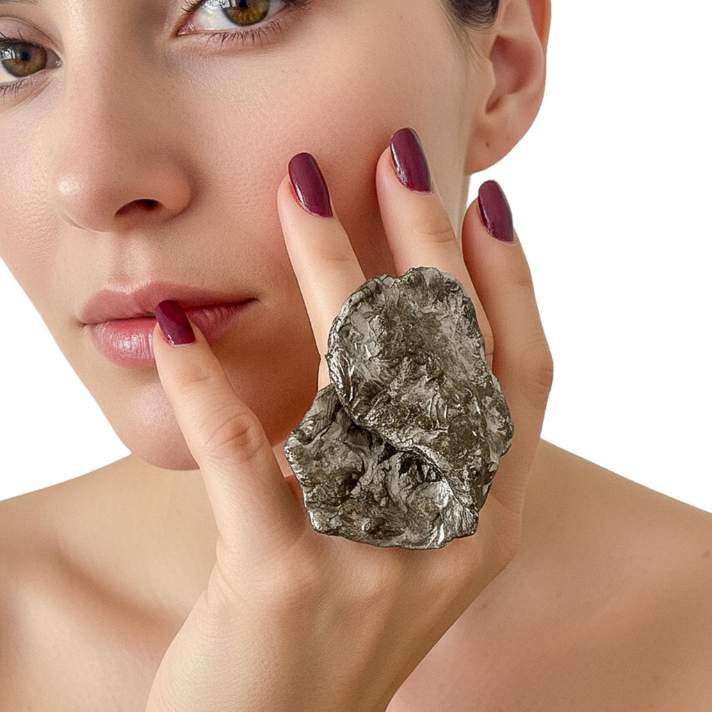 Silver Expansion — Sculptural Paper Ring — studio view