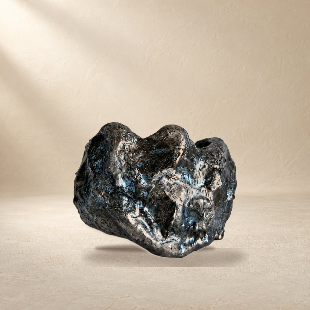 Storm Fold bracelet resting on a warm cream surface