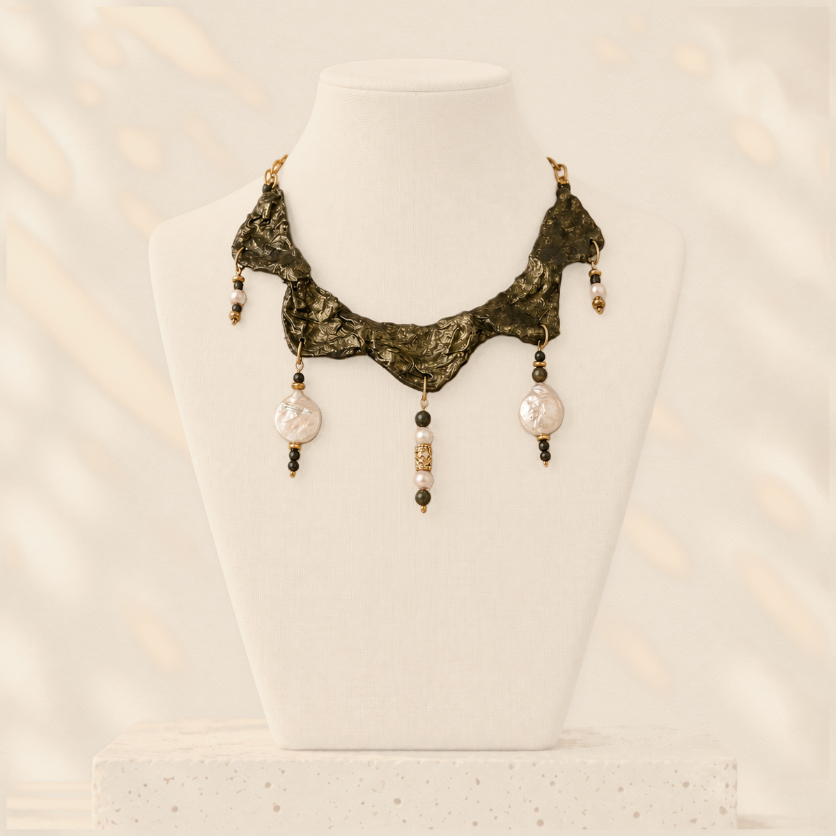 Anchored Pearl — Sculptural Paper Necklace on warm cream background