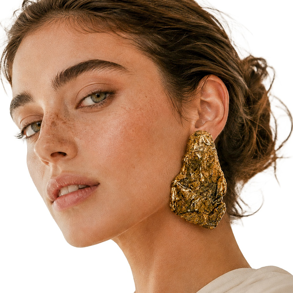 Resilient Arc — Handmade Sculptural Paper Earrings — studio view