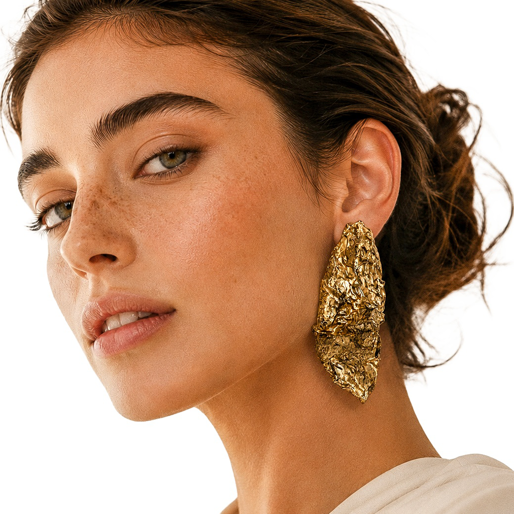 Held Tension — Handmade Sculptural Paper Earrings — studio view