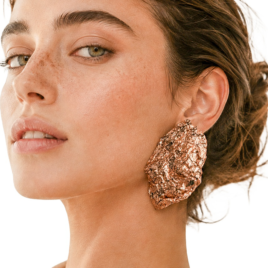 Copper Bloom — Handmade Sculptural Paper Earrings — studio view