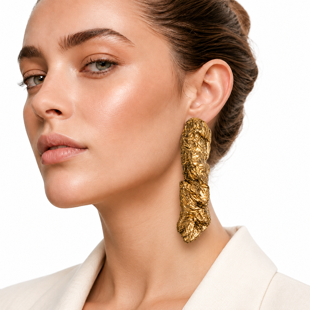 Gilded Compression — Handmade Sculptural Paper Earrings — studio view