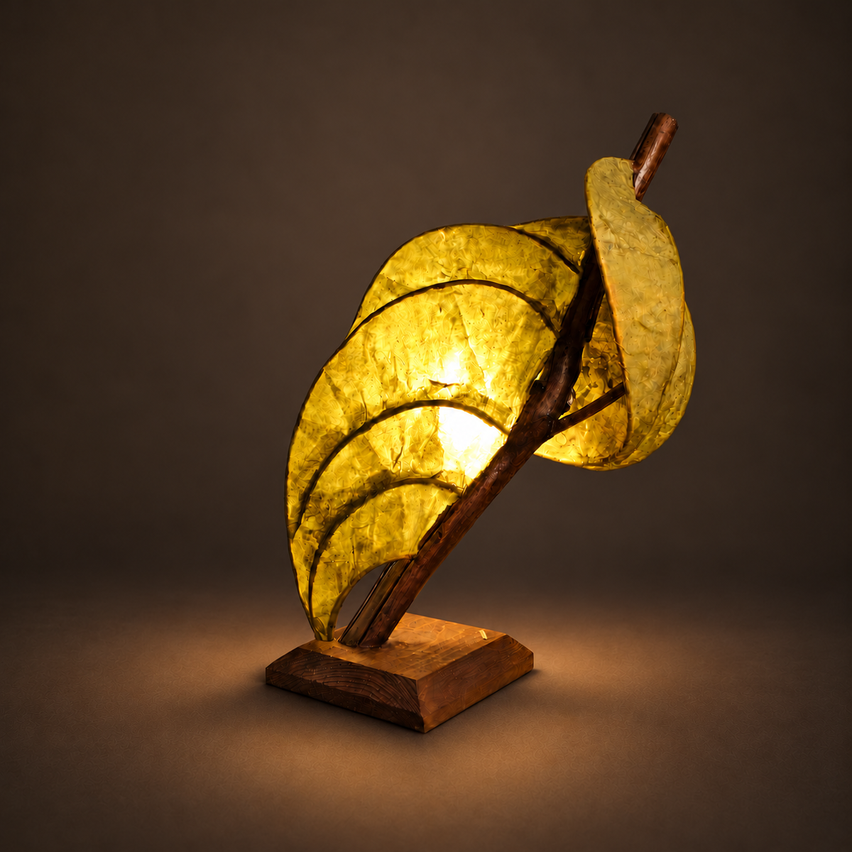 Forest Flow sculptural lamp illuminated against warm charcoal