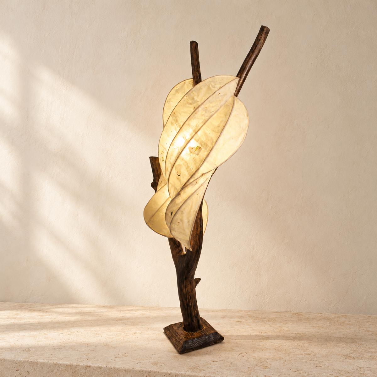 Moonleaf sculptural lamp, alternate side view in a bright minimal interior
