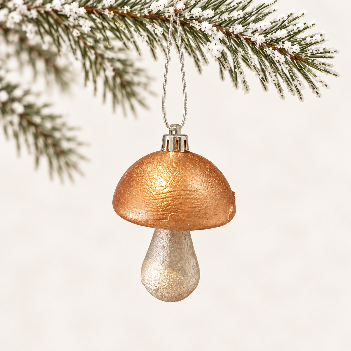 Mushroom form with a textured gold-toned cap and a silver-toned stem.