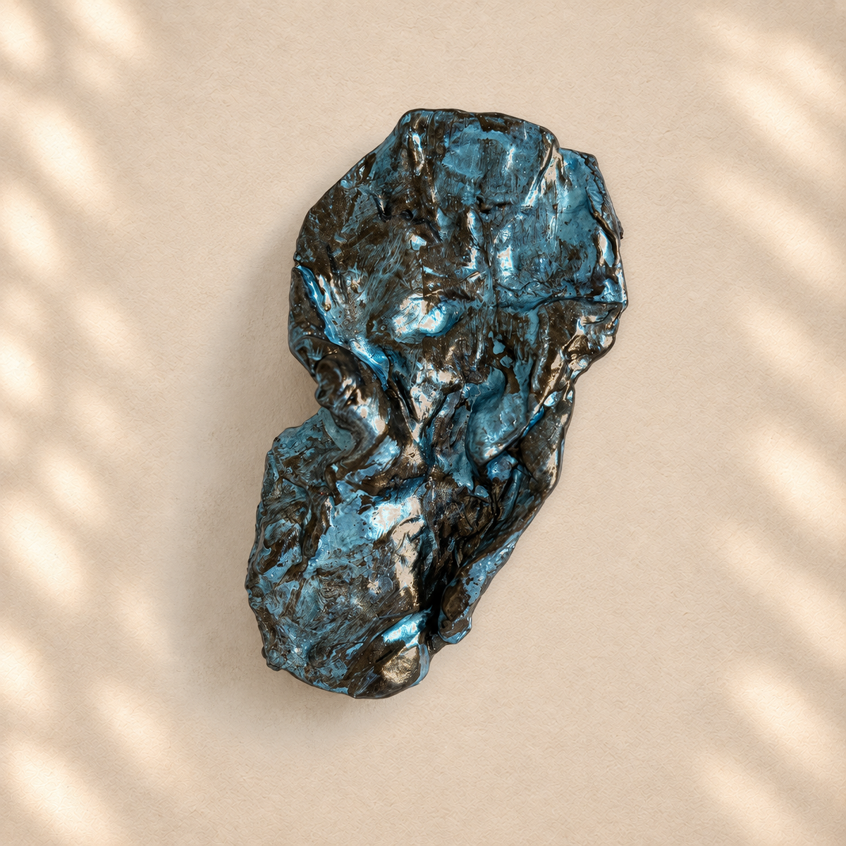 Blue Patina brooch on warm cream background