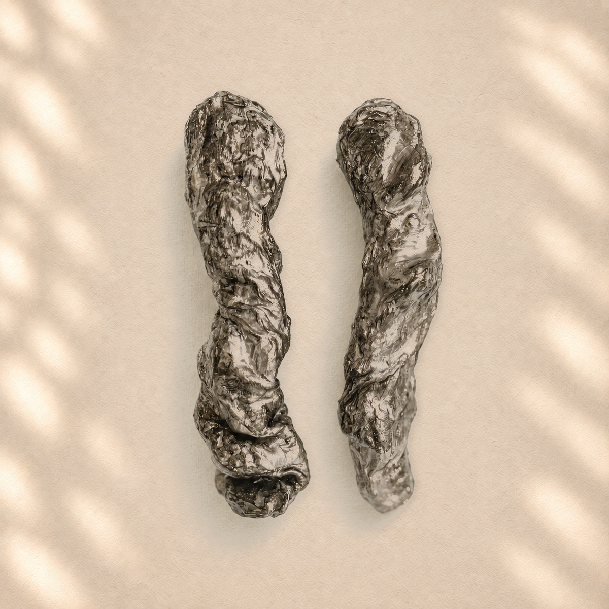 Silver Torsion — Handmade Sculptural Paper Earrings