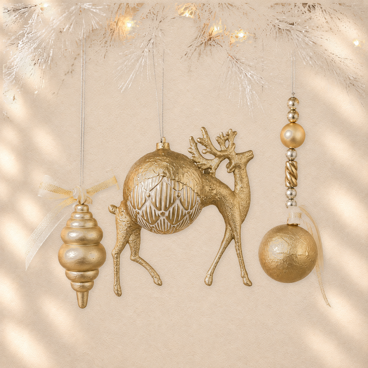 Gilded Deer Trio — Set of 3 Sculptural Ornaments on warm cream background