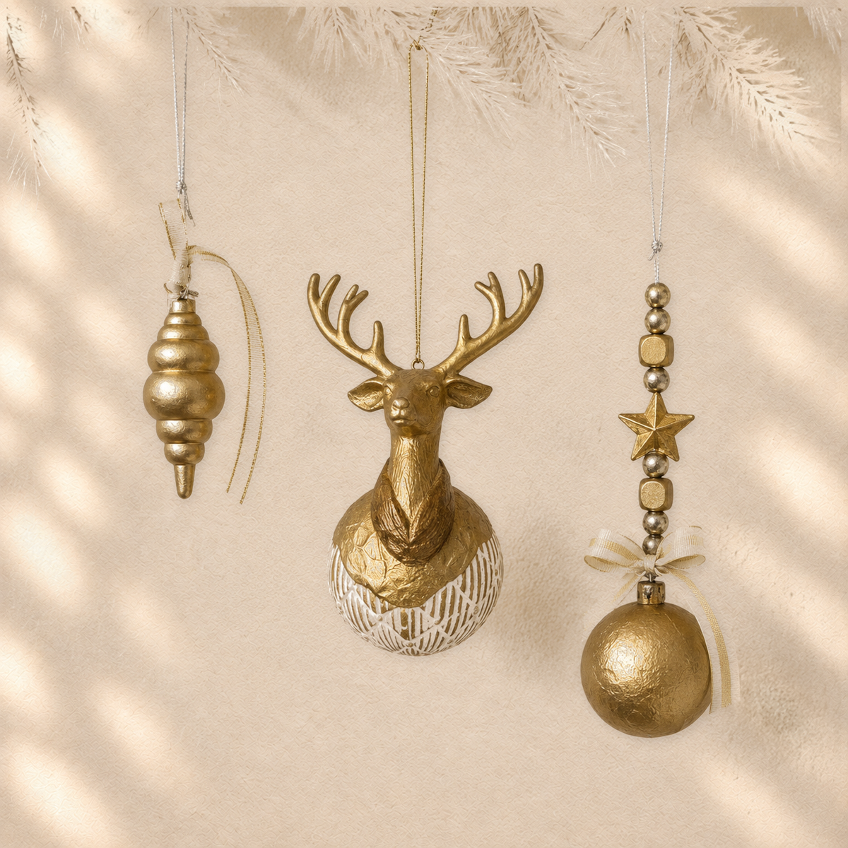 Gilded Antler Trio — Set of 3 Sculptural Ornaments on warm cream background
