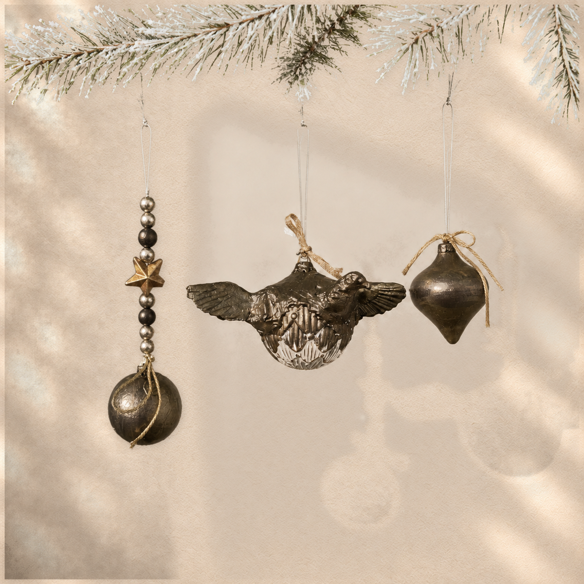 Bronze Flight Trio — Set of 3 Sculptural Ornaments on warm cream background