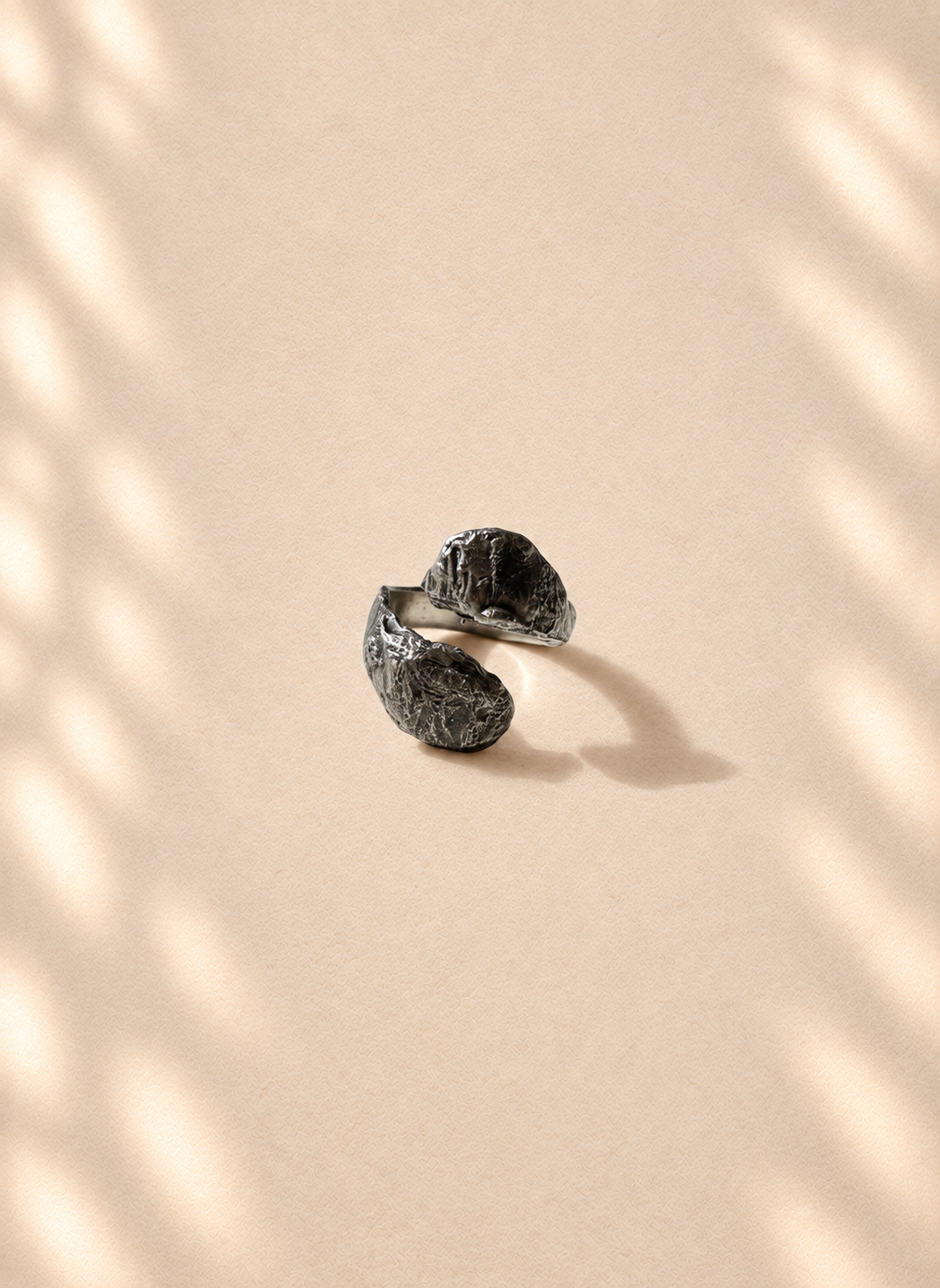 Silver Coil — Sculptural Paper Ring product only on warm cream background