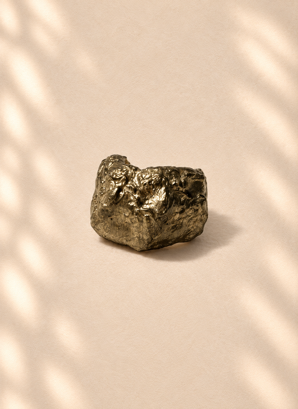 Gilded Core — Sculptural Paper Ring product only on warm cream background