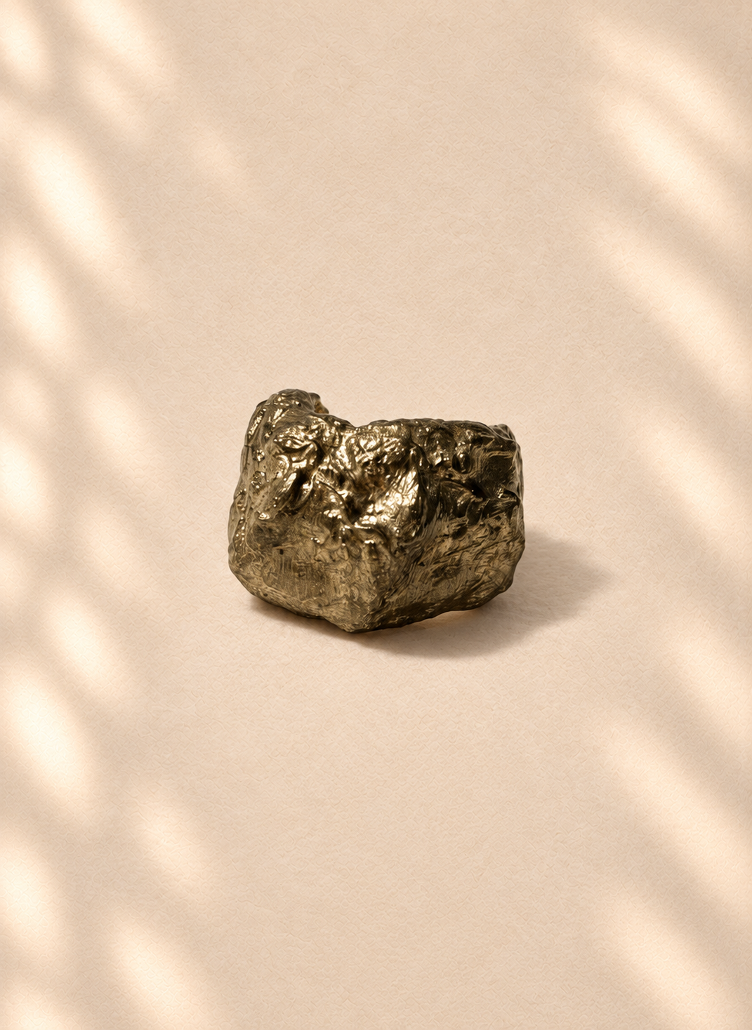 Gilded Core — Sculptural Paper Ring product only on warm cream background
