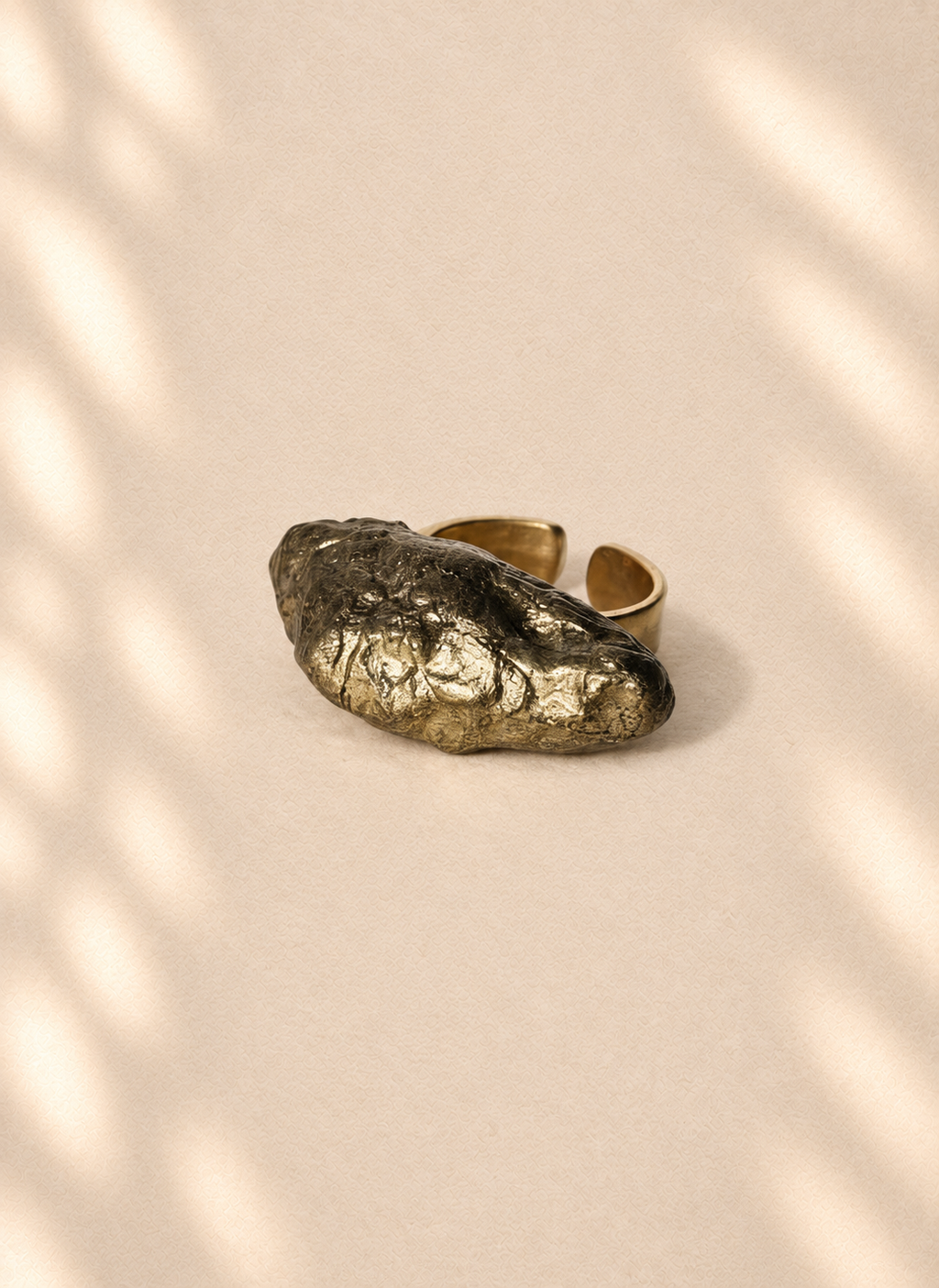 Gilded Twist — Sculptural Paper Ring product only on warm cream background