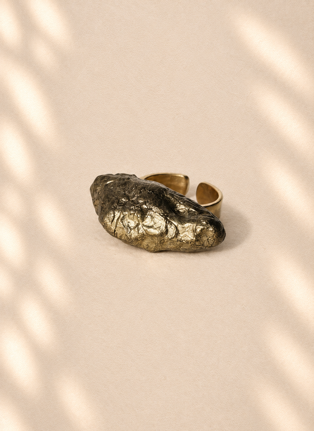 Gilded Twist — Sculptural Paper Ring product only on warm cream background