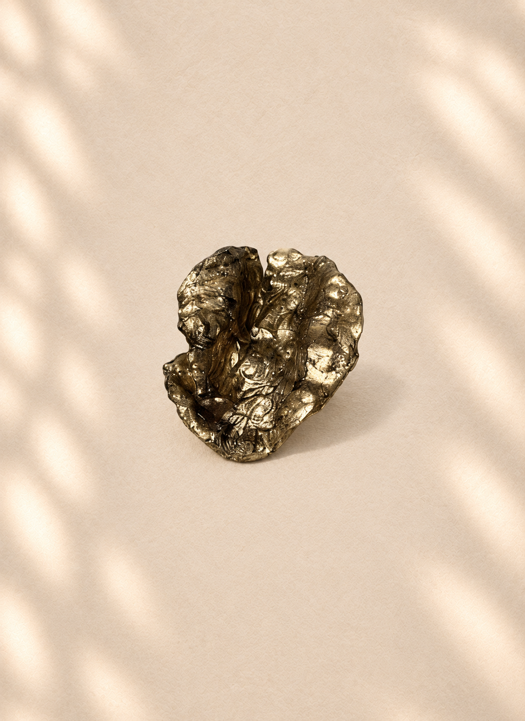 Gilded Orbit — Sculptural Paper Ring product only on warm cream background
