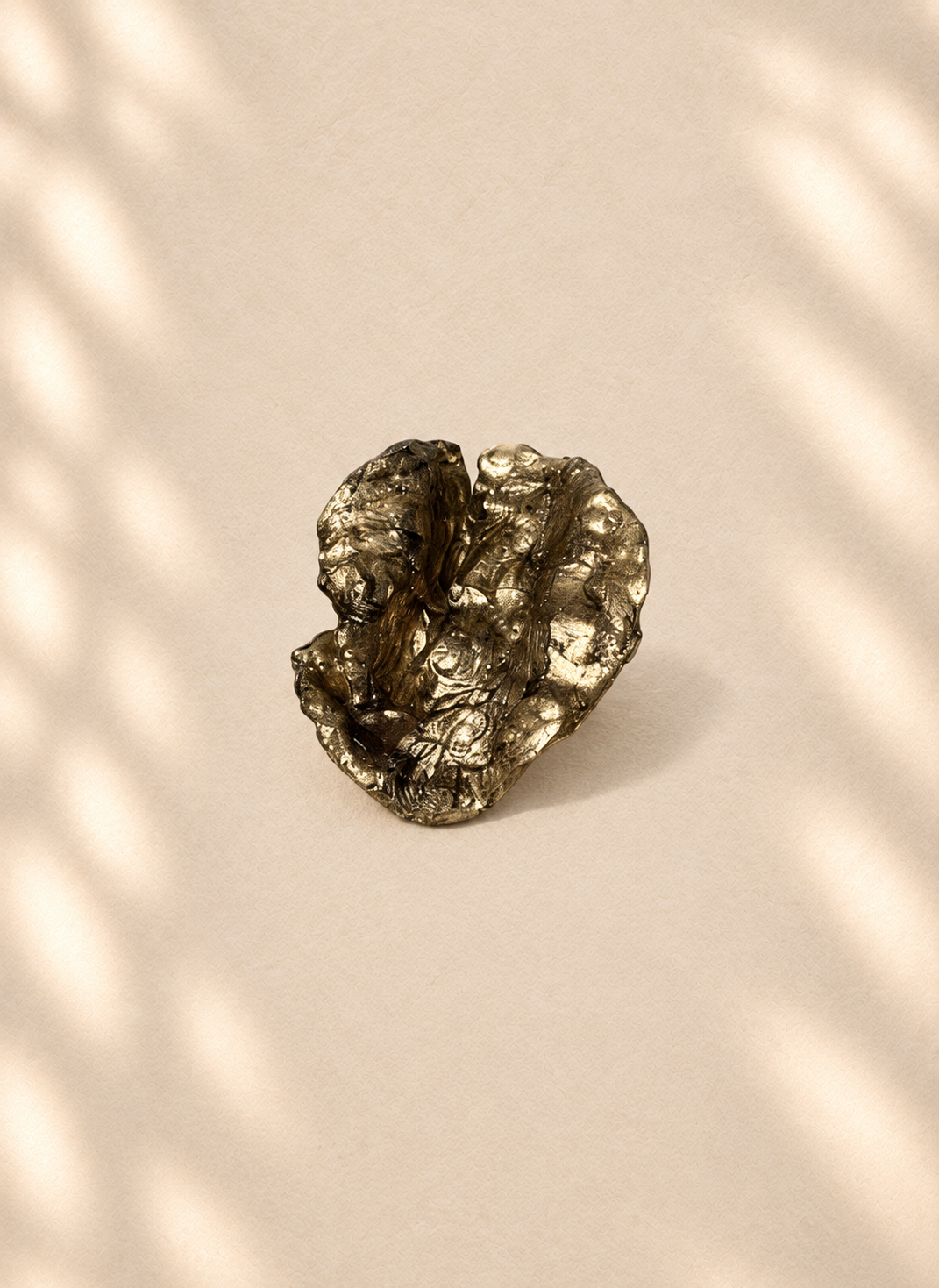 Gilded Orbit — Sculptural Paper Ring product only on warm cream background