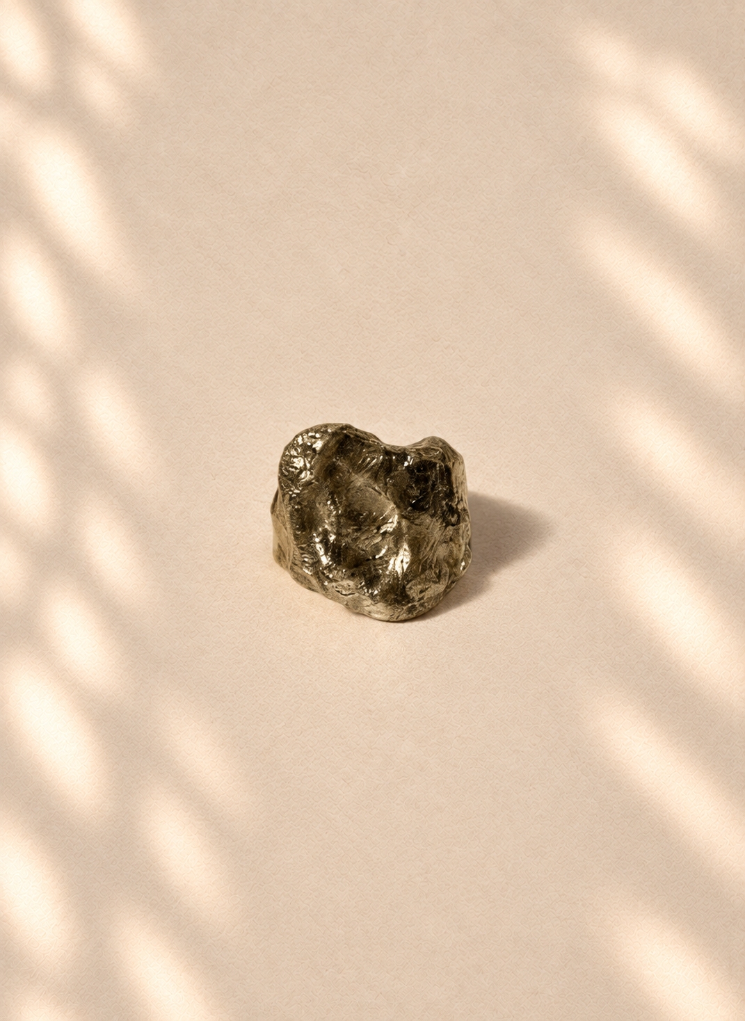 Gilded Aperture — Sculptural Paper Ring product only on warm cream background