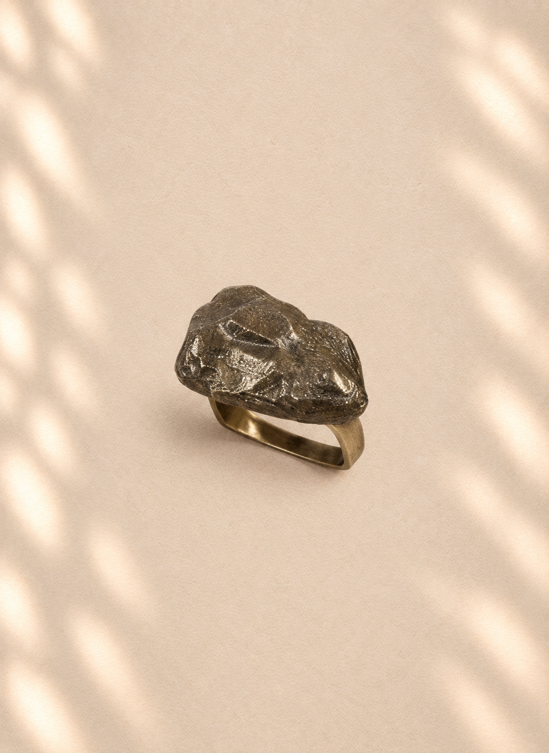 Obsidian Span — Sculptural Paper Ring product only on warm cream background