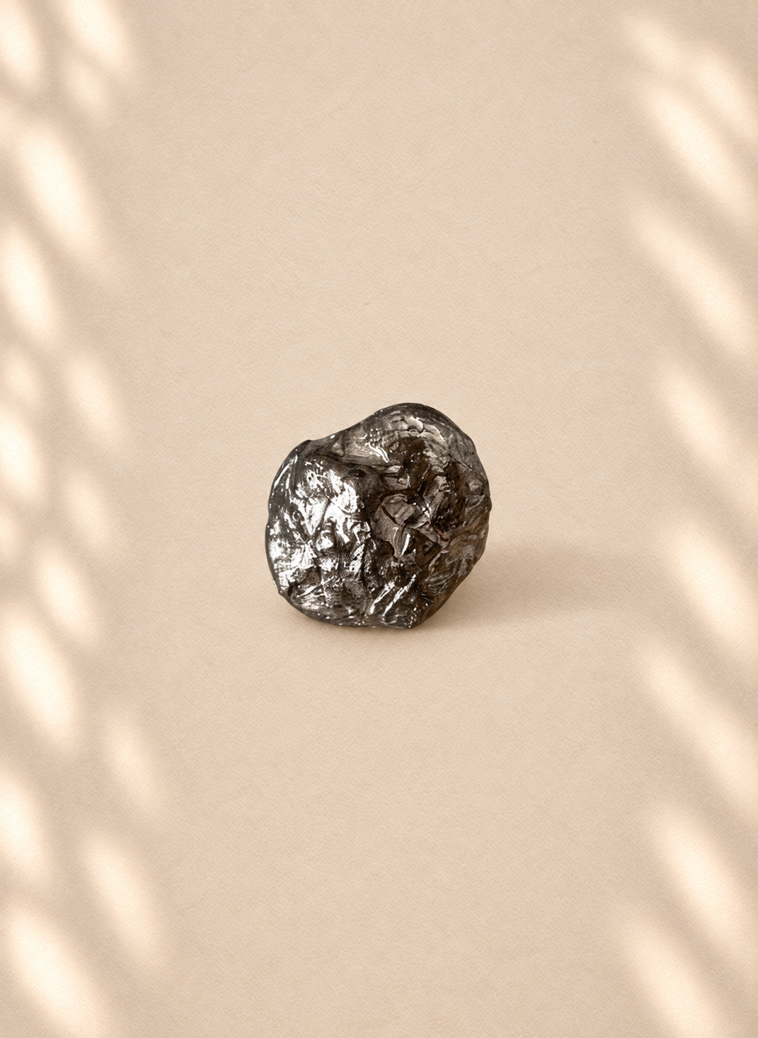Silver Core — Sculptural Paper Ring product only on warm cream background