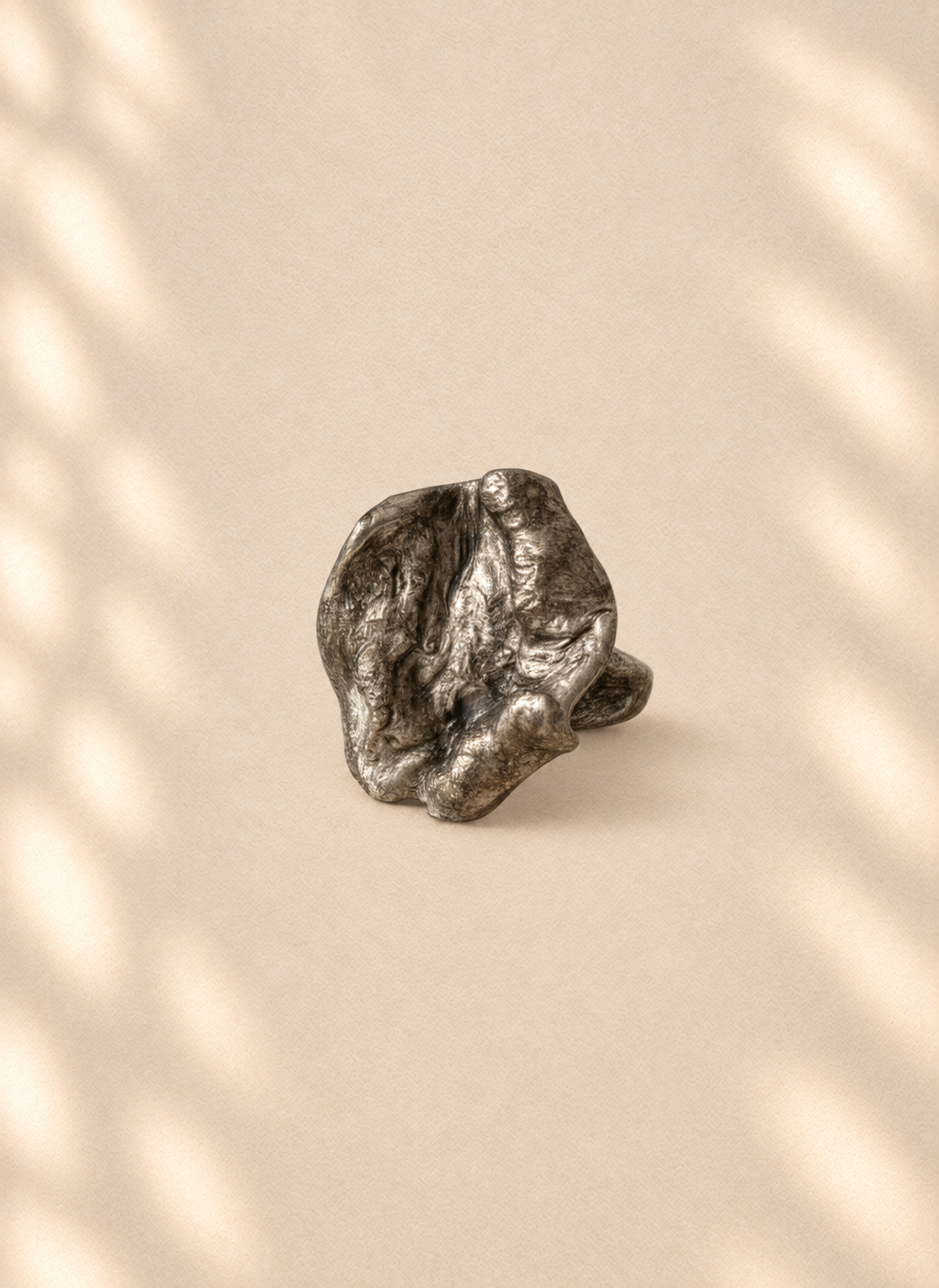 Silver Crest — Sculptural Paper Ring product only on warm cream background