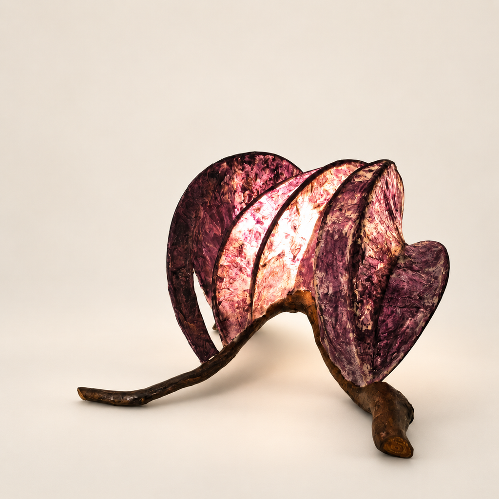Rose Ember sculptural lamp, additional original angle 1 on warm ivory