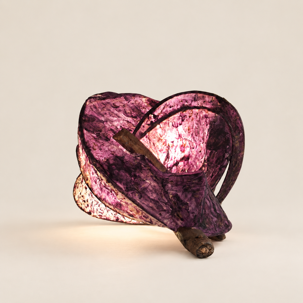 Rose Ember sculptural lamp, additional original angle 2 on warm ivory
