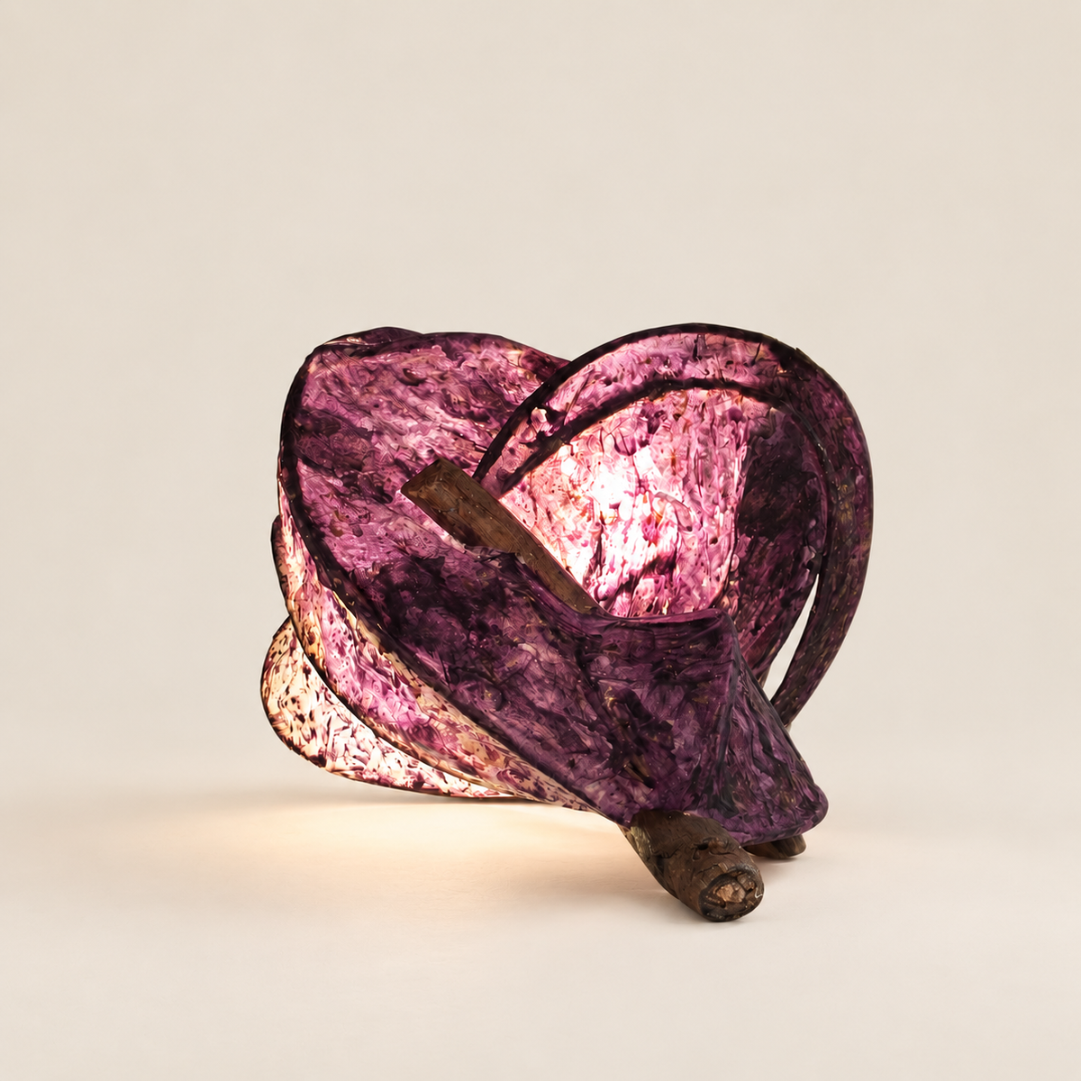 Rose Ember sculptural lamp, additional original angle 2 on warm ivory