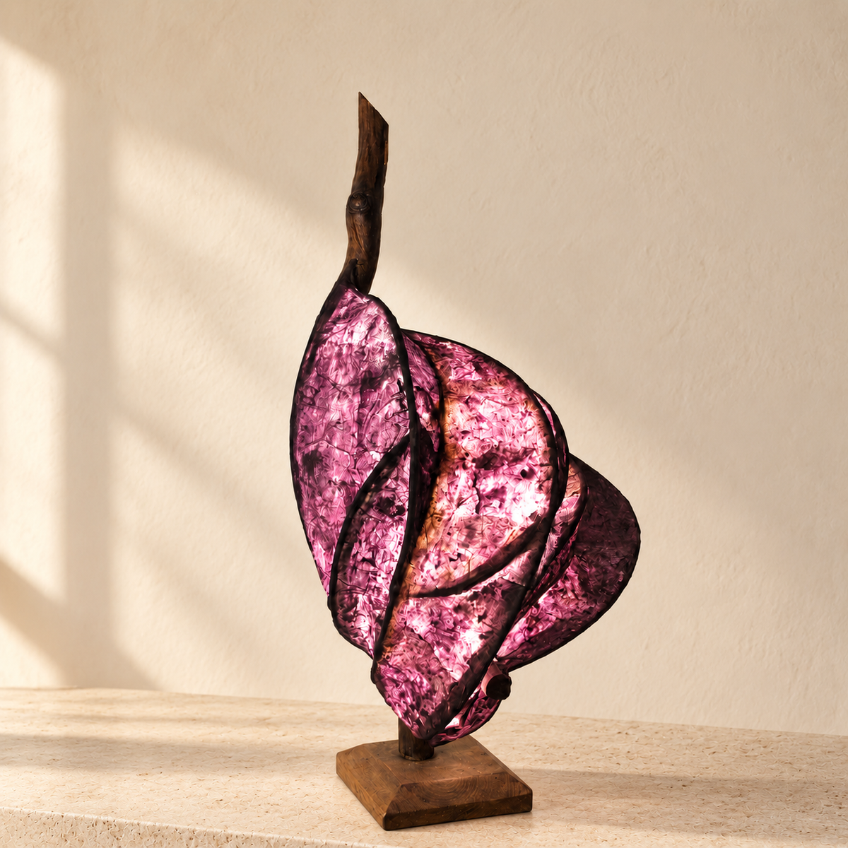 Violet Ember sculptural lamp, alternate side view in a bright minimal interior